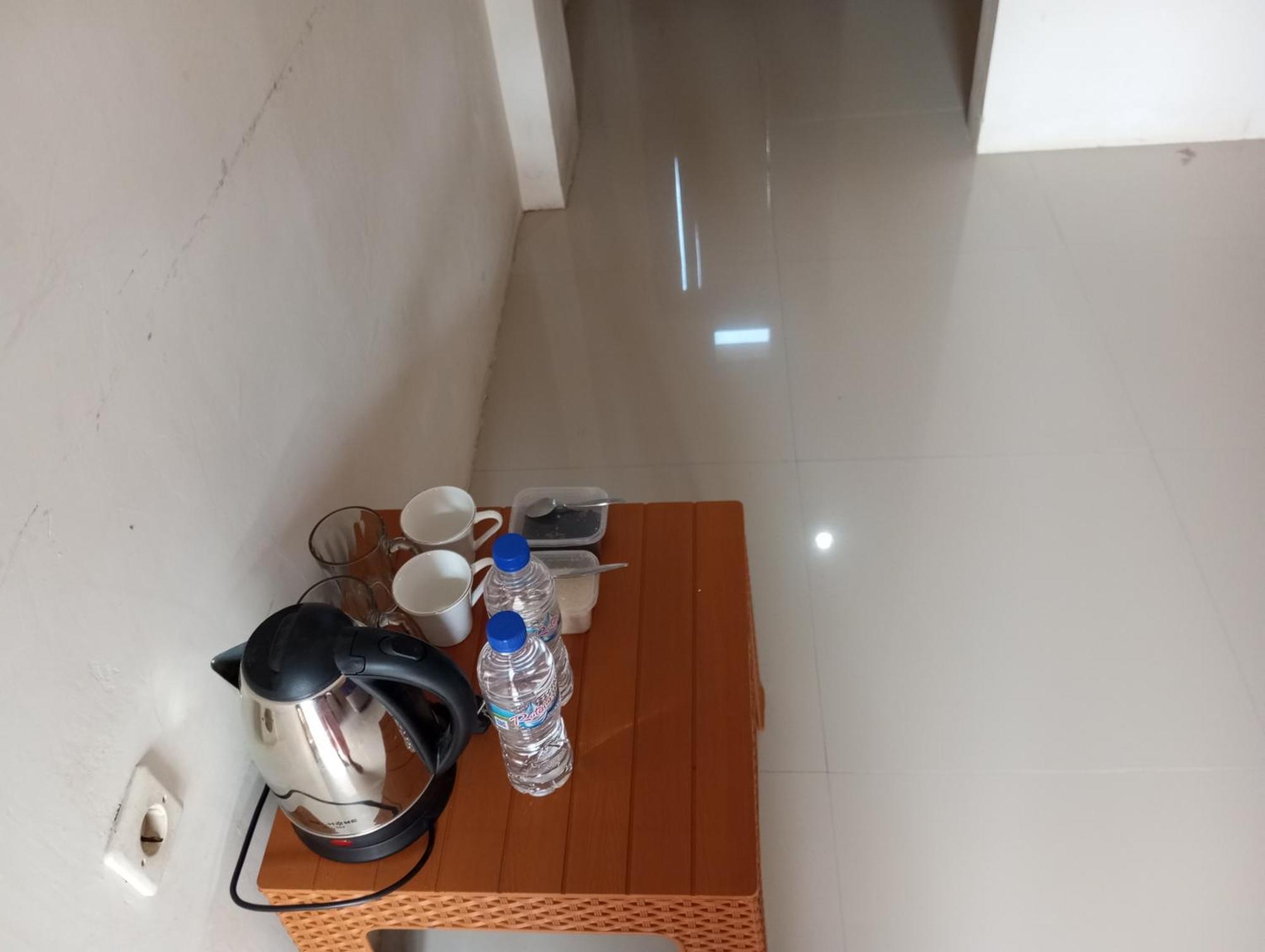 Wl Guesthouse Labuan Bajo Quarto foto